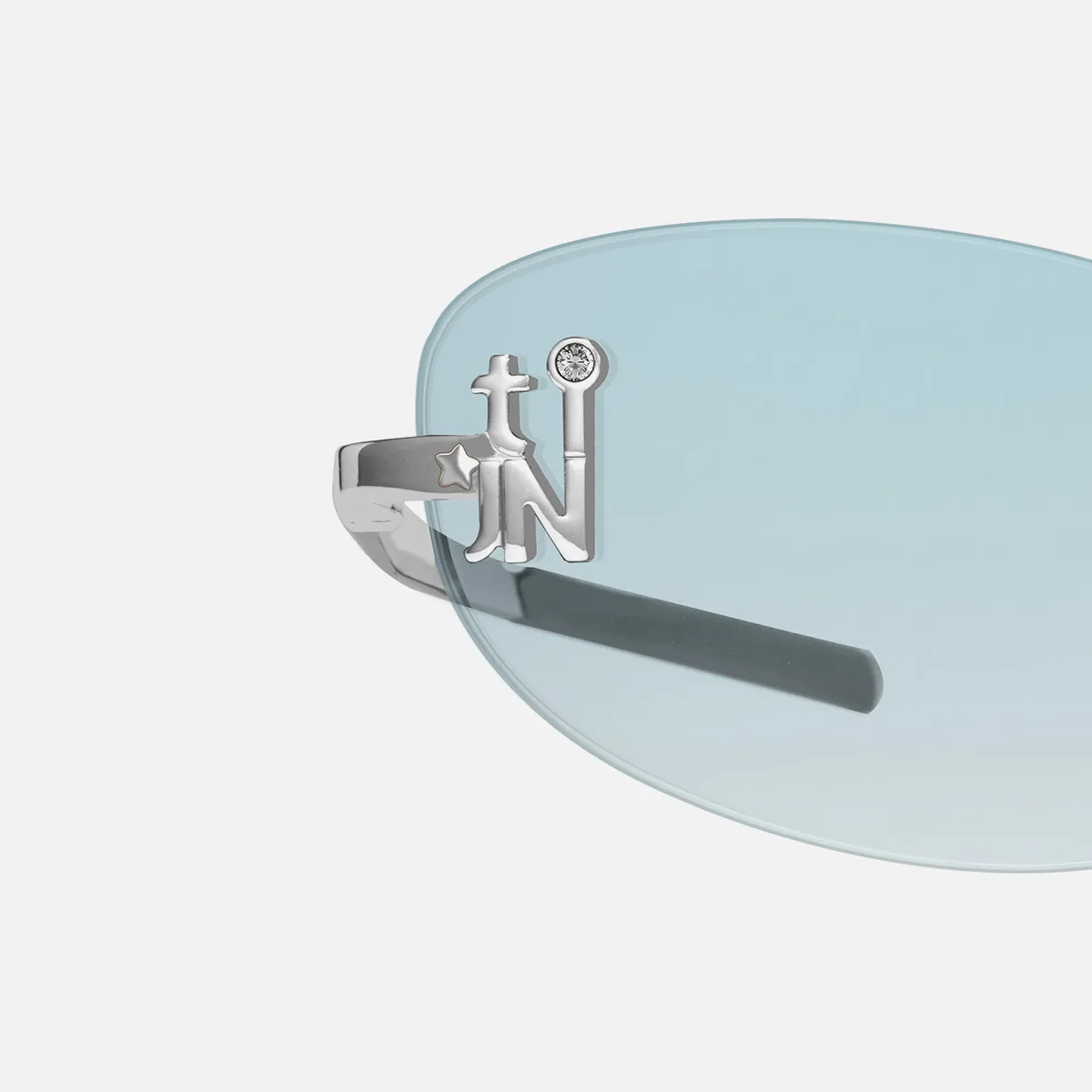 Emblematic O 01 colour tinted blue light glasses in silvery with Emblematic O 01 colour tinted blue light glasses in silvery with